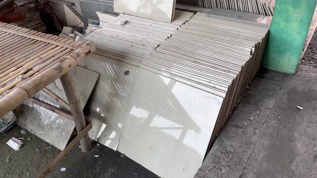 Stack of ceramic tiles on construction site