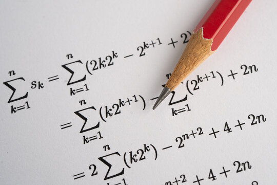 Pencil on mathematic formula exercise test paper in education school.