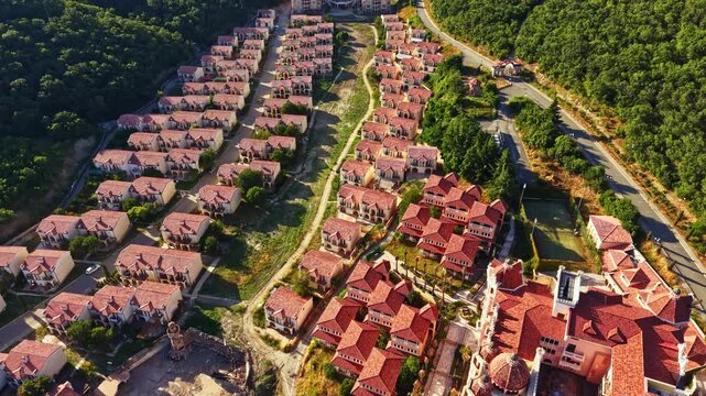 Elenite shows the impact of a recent flood as houses appear damaged and the area is changed. Many roads and buildings are affected by rising water levels.