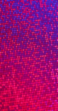 Abstract twinkling ovals background. Dense sparkling sequins in vibrant green orange pink and red tones, smooth rotation. Ideal for fashion, party and glamour backgrounds. 