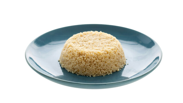 Freshly cooked delicious fluffy couscous served on a dark blue ceramic plate with soft lighting for a healthy meal presentation captured neatly on transparent background