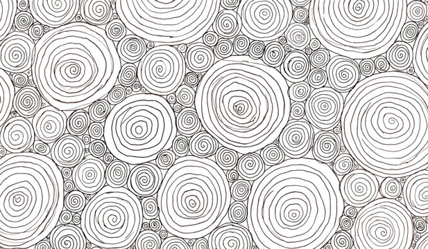 Abstract pattern of handdrawn concentric circles and spirals in various sizes filling the frame
