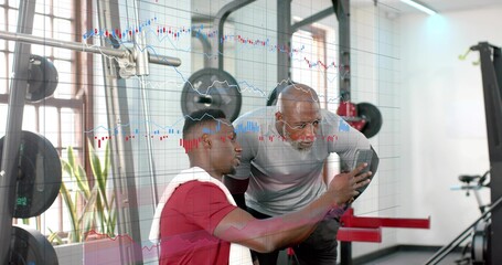 Trainer approaching, leaning in while trainee rotating phone, tapping, viewing data for training © vectorfusionart
