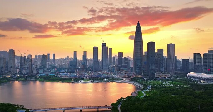 Sunset over modern financial district skyline and bay area cityscape in Shenzhen, China