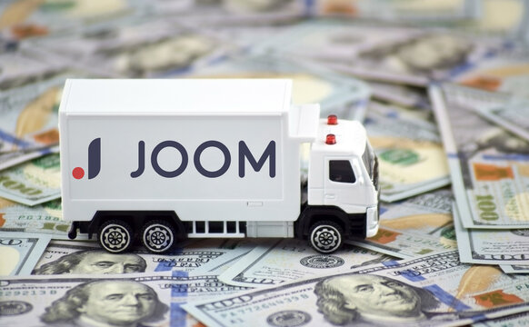 The truck with the emblem JOOM. Trade tariffs and competition.