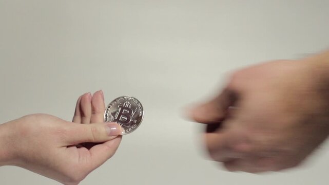 Hand-to-hand exchange of dollars for Bitcoin