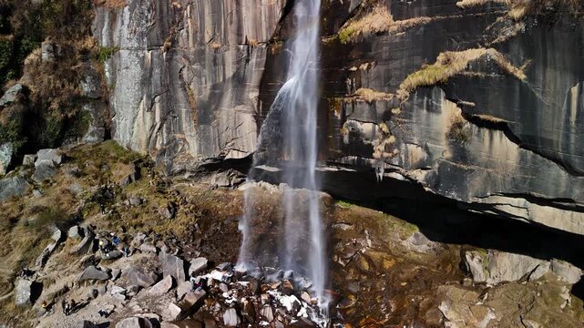 Scenic Aerial View of Jogini Waterfall Near Manali Surrounded by Lush Green Forest, Rocky Cliffs, Flowing Mountain Stream, Himalayan Landscape, Misty Environment and Beautiful Natural Waterfall Scener