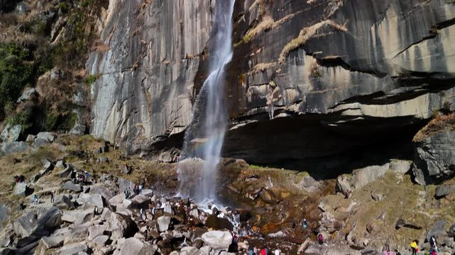 Scenic Aerial View of Jogini Waterfall Near Manali Surrounded by Lush Green Forest, Rocky Cliffs, Flowing Mountain Stream, Himalayan Landscape, Misty Environment and Beautiful Natural Waterfall Scener