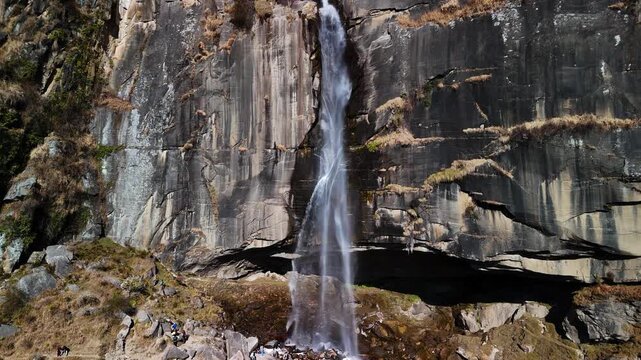 Scenic Aerial View of Jogini Waterfall Near Manali Surrounded by Lush Green Forest, Rocky Cliffs, Flowing Mountain Stream, Himalayan Landscape, Misty Environment and Beautiful Natural Waterfall Scener