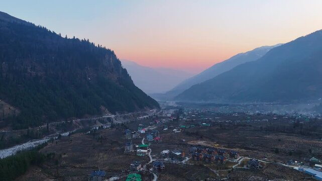 Beautiful Sunrise Aerial View of Manali Valley with Snow Covered Himalayan Mountains, Golden Morning Light, Misty Landscape, Green Forests, Peaceful Mountain Scenery, Crystal Clear Sky and Breathtakin