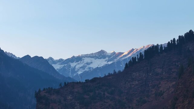 Beautiful Sunrise Aerial View of Manali Valley with Snow Covered Himalayan Mountains, Golden Morning Light, Misty Landscape, Green Forests, Peaceful Mountain Scenery, Crystal Clear Sky and Breathtakin