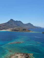 Panoramic aerial view of Balos Lagoon, Crete. A protected Natura 2000 ecological reserve featuring pristine Mediterranean turquoise water.