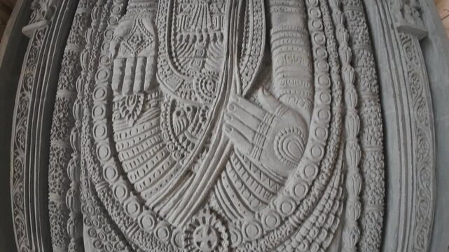 Handcrafted Cemented Wall Sculpture of a Hindu Deity with Detailed Craftsmanship at Baba Mastnath Temple in Rohtak Haryana