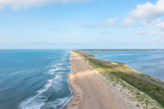 Aerial View of Highway 12 in the Outer Banks With the Ocean on one Side and the Sound on the Other