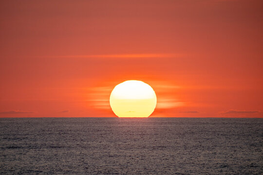 The Sun Rising over the Atlantic Ocean in Avon North Carolina Horizontal