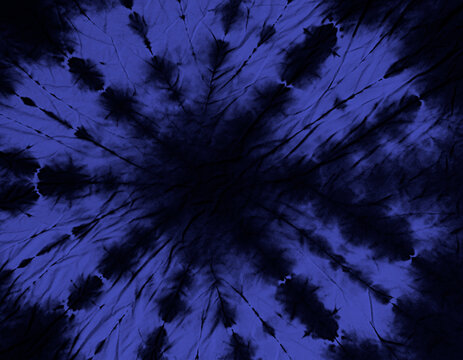 A dark blue tie-dye pattern radiates outwards from a central black void. The pattern creates a starburst or mandala-like effect.