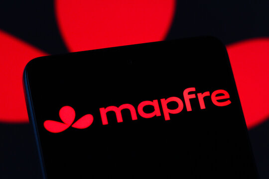 In this photo illustration, the Mapfre logo is seen displayed on a smartphone screen.