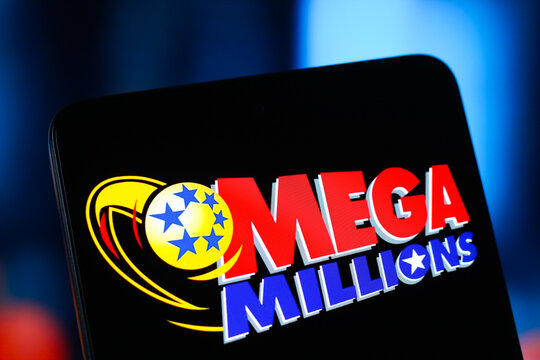 In this photo illustration, the Mega Millions logo is seen displayed on a smartphone screen.