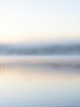Silent morning mist lingers on calm lake surface, serene, calm