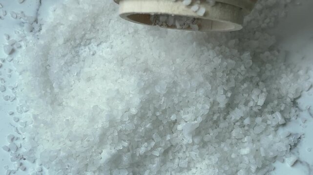 Wooden jar with salt crystals for spa texture and transition concept