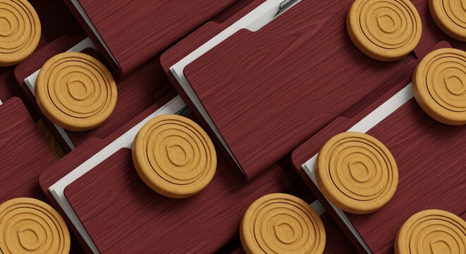 Golden cookies arranged on red folders for creative presentation.