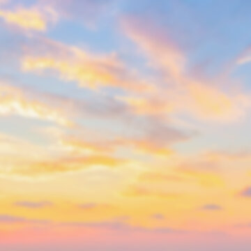 Abstract blurred pastel sunset or sunrise sky, soft dreamy defocused square background texture with copy space