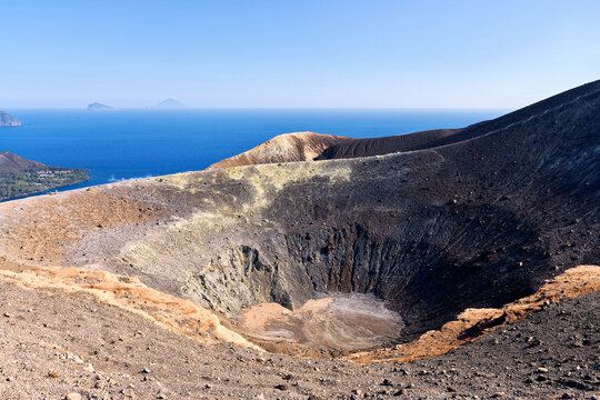 Grand Crater volcanic cone on Vulcano island with Panarea and Stromboli in the background, Sicily