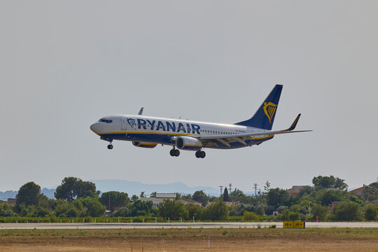 Ryanair passenger airplane approaching runway for landing at Valencia airport. Valencia, Spain - June 20, 2026.