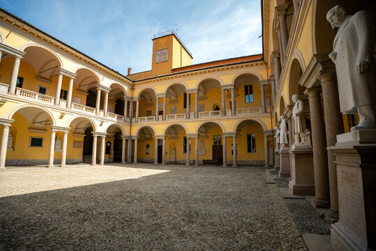 The Alessandro Volta courtyard with statues of famous scholars at the University of Pavia, Lombardy, Italy