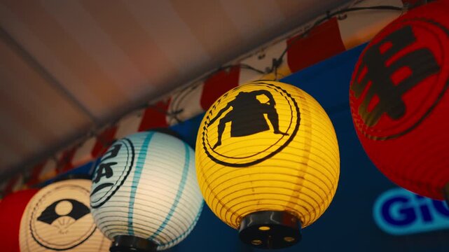Glowing Japanese Paper Lanterns at a Festival Stall