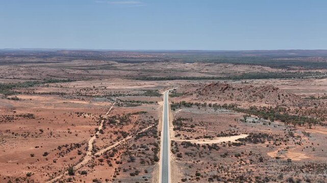 High Angle View of the Stuart Highway Stretching Through the Remote Red Desert Landscape of the Australian Outback, Northern Territory