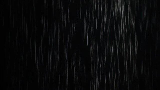 Realistic heavy rain falling on a black background seamless loop.