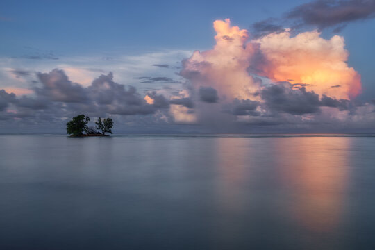 Dramatic clouds above the sea after sunset in Seychelles