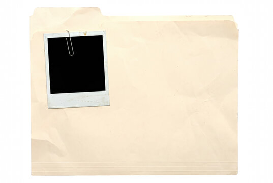 Vintage manila file folder with attached instant photo frame