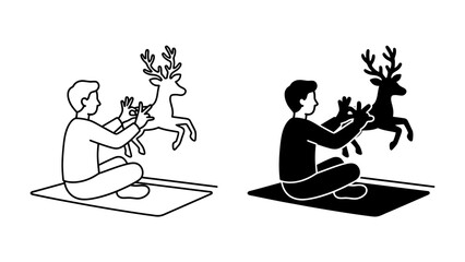 Reindeer Puppet Show: A person sits cross-legged on the floor, operating two reindeer puppets, one in line art and the other in silhouette, in a playful performance. © Nadim