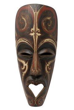 Traditional Carved Wooden Tribal Ceremonial Mask With Ornate Swirl Patterns On Transparent Background