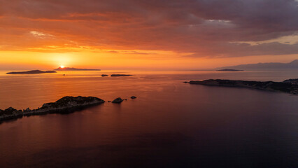 Fototapeta premium Diakopo and Karavi islands sunset in Corfu, Greece