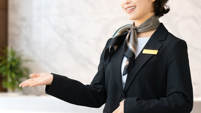 ホテルで案内をする女性・コンシェルジュ, Female Hotel Concierge Providing Guidance