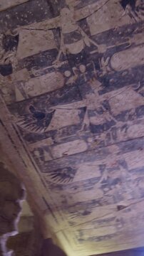 Ancient Egyptian chamber with statues and decorated ceiling inside the Abu Simbel Temple, showcasing sacred architecture, carvings, and timeless spiritual symbolism. Egypt.