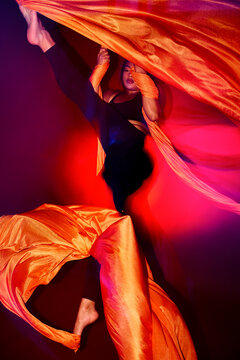 Aerial Silks Motion In Neon