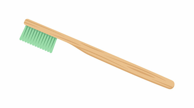 A green-bristled toothbrush with a wooden handle lies on a surface.