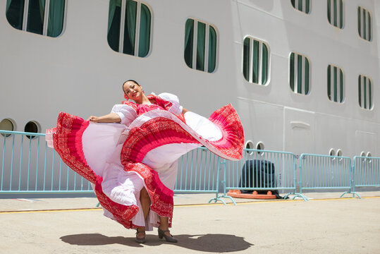 Latin Woman Dancing with Traditional Clothes