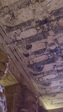Ancient Egyptian chamber with statues and decorated ceiling inside the Abu Simbel Temple, showcasing sacred architecture, carvings, and timeless spiritual symbolism. Egypt.