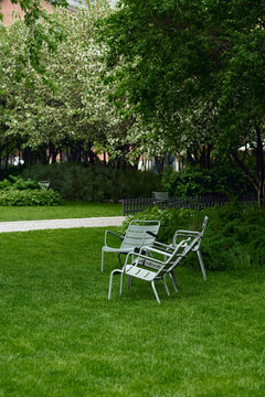 Chairs in the park during spring day