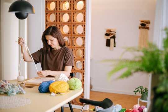  creation of a handmade textile piece.