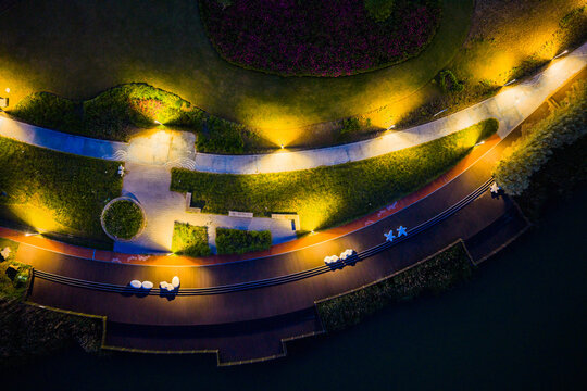  illuminated curved waterfront park promenade