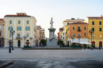 Fototapeta premium Vittorio Emanuele II monument on the public square of Piazza d'Italia in Sassari, Sardinia, Italy