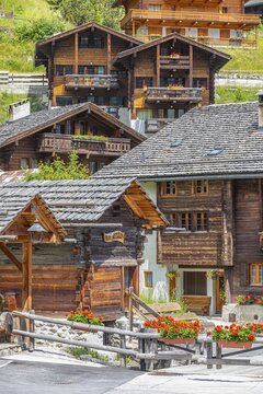 Old wooden houses with wooden shingle roofs in the historic centre of Grimentz, Val d'Anniviers, Valais Alps, Canton Valais, Switzerland