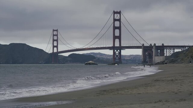 Crashing Waves On Beach On Overcast Day Near Golden Gate Bridge, Wide Shot