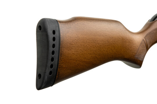 Close-up of a rifle wooden buttstock with a black rubber recoil pad, isolated on a white back